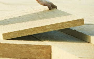 measuring Gospel Green tapered insulation